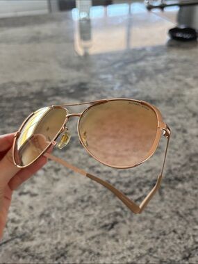 Michael Kors Rose Gold Aviator Sunglasses with Pink-Tinted Lenses